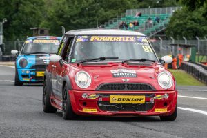 Robbie Dalgleish racing in Mini Challenge at Oulton Park